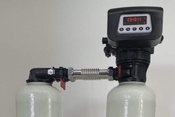 Dual purpose water softener and water conditioner with full sized carbon tank.